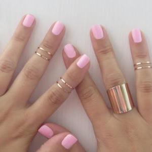 Set Of 6 Rose Gold Stacking Rings With 1 Tube Ring..