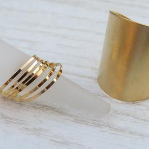 Set of 6 gold stacking rings with 1..